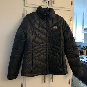 Women’s The North Face down jacket.
